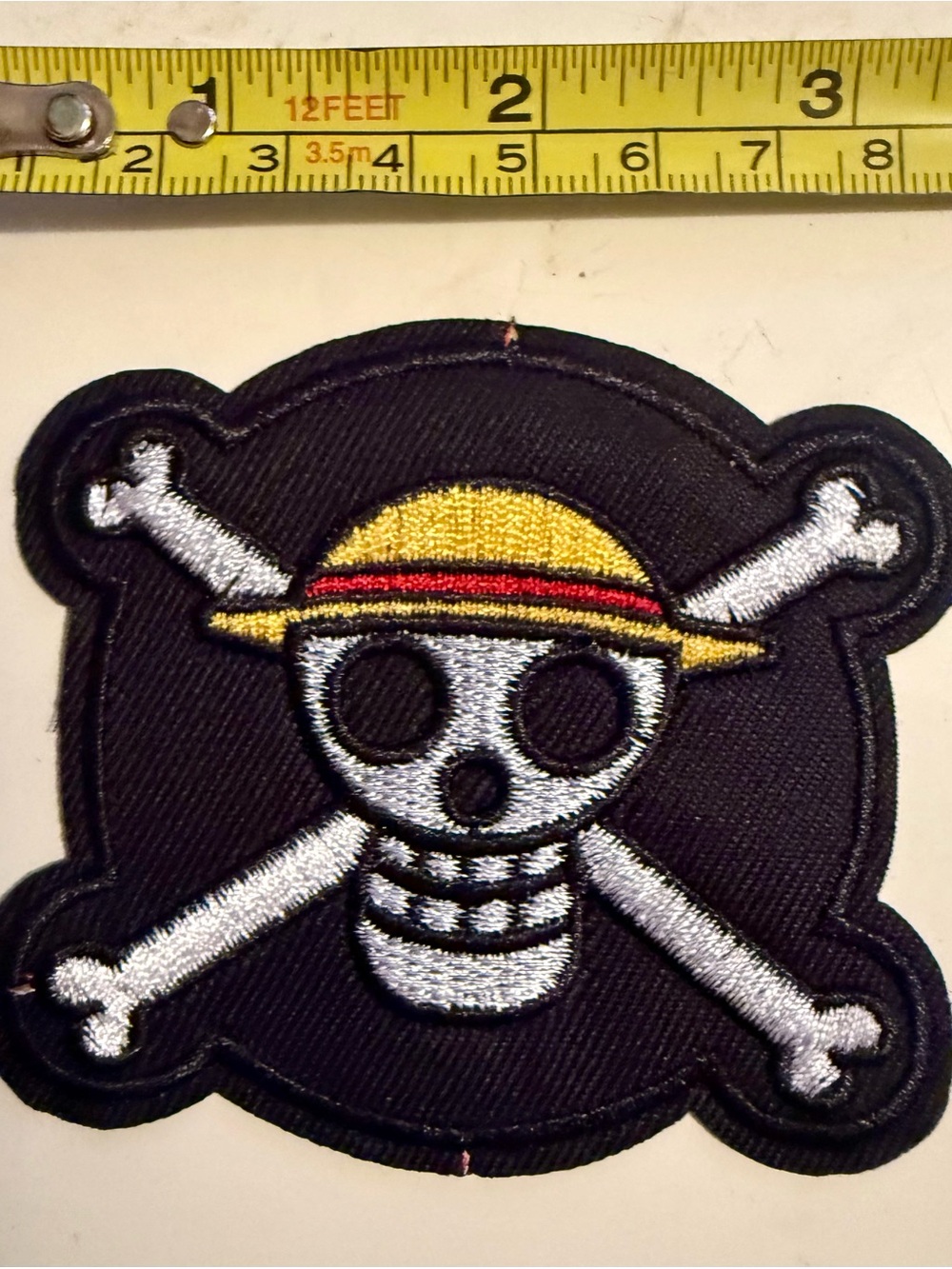 Embroidered Skull & Crossbones Patch with Yellow Straw Hat